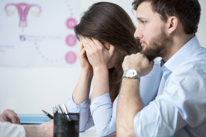 Crying woman with husband